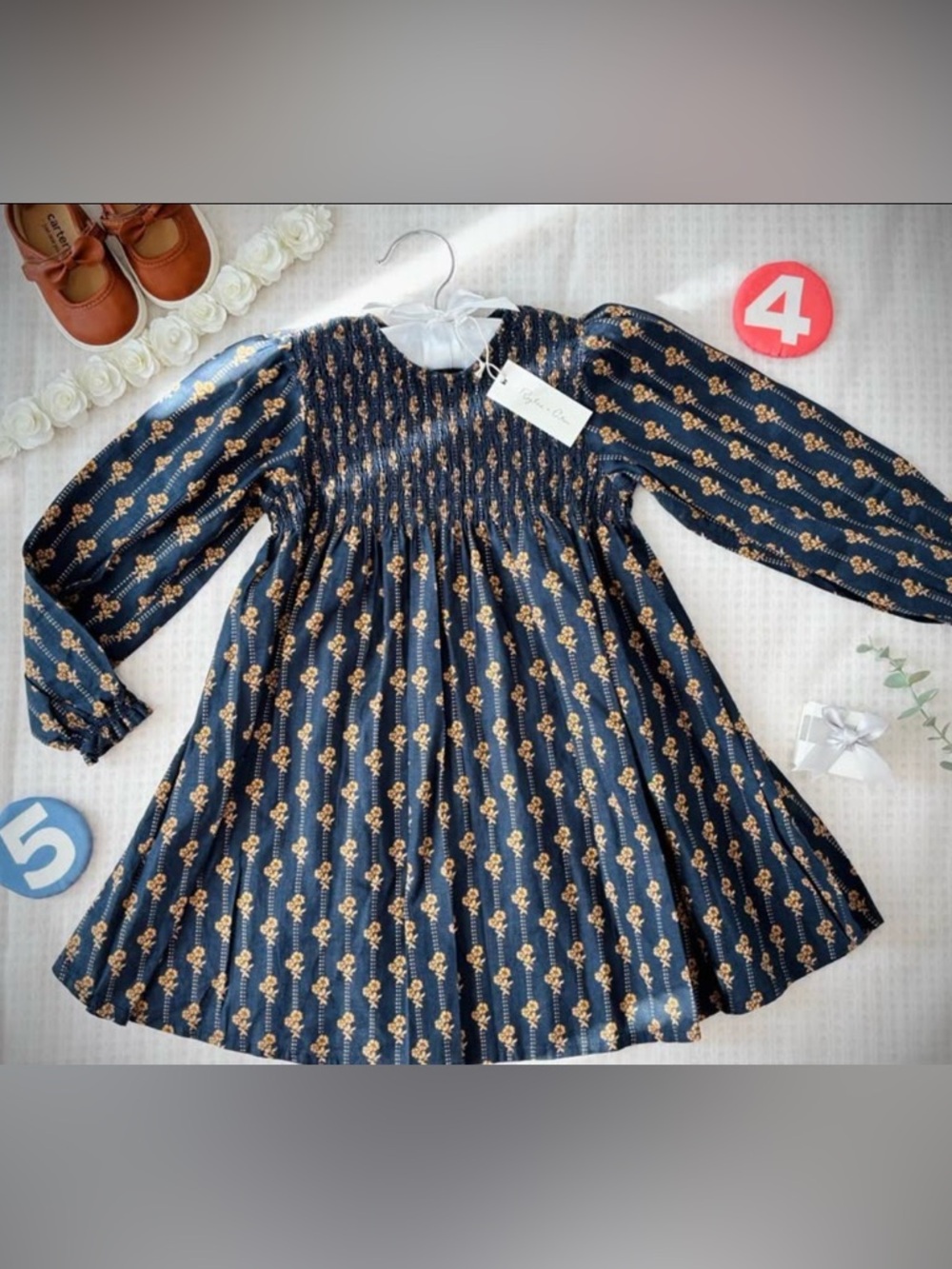 Rylee + Cru Navy and Gold Floral Smocked Long-Sleeve Dress